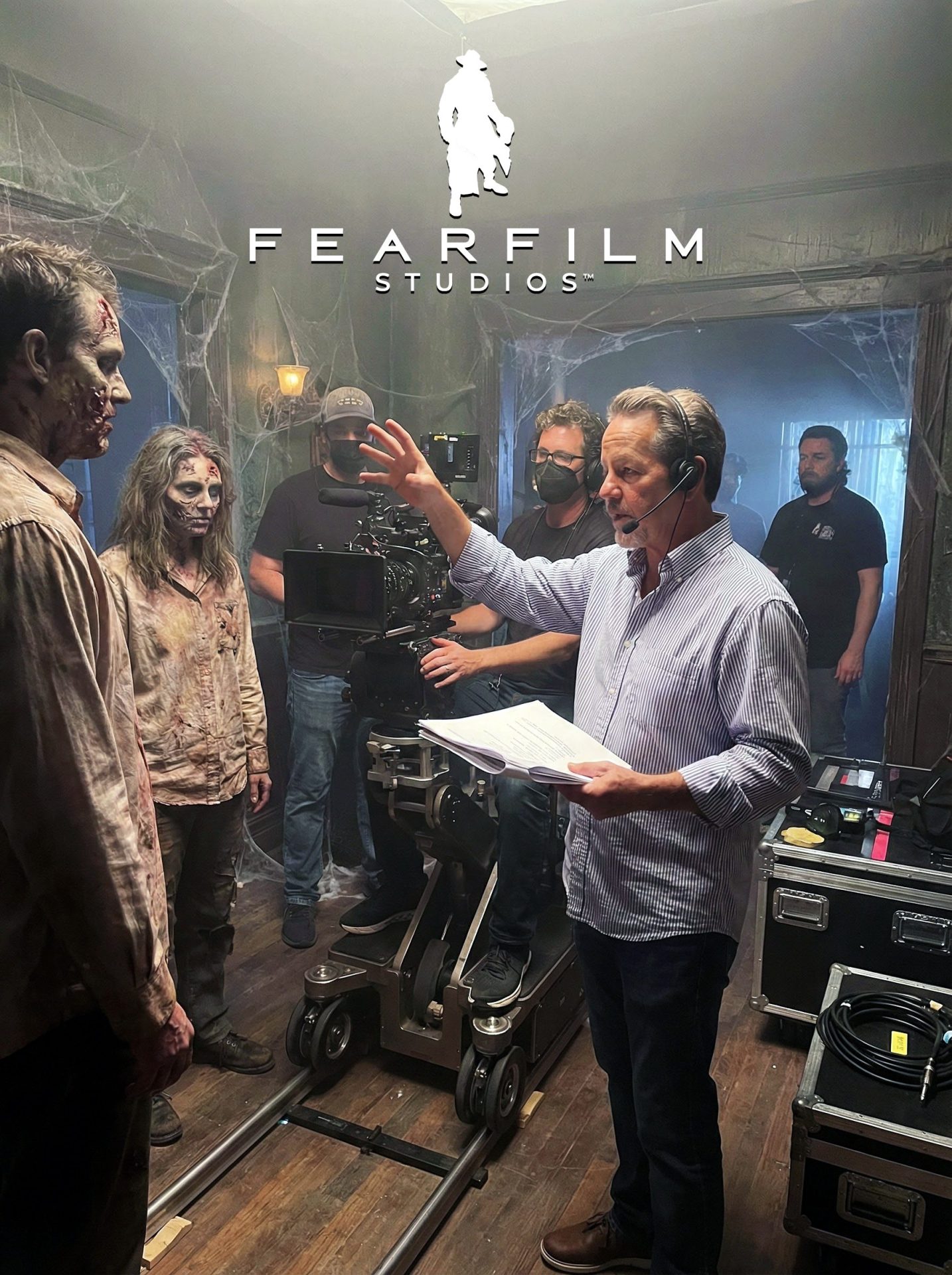 Robert Massetti directing a horror film on set.